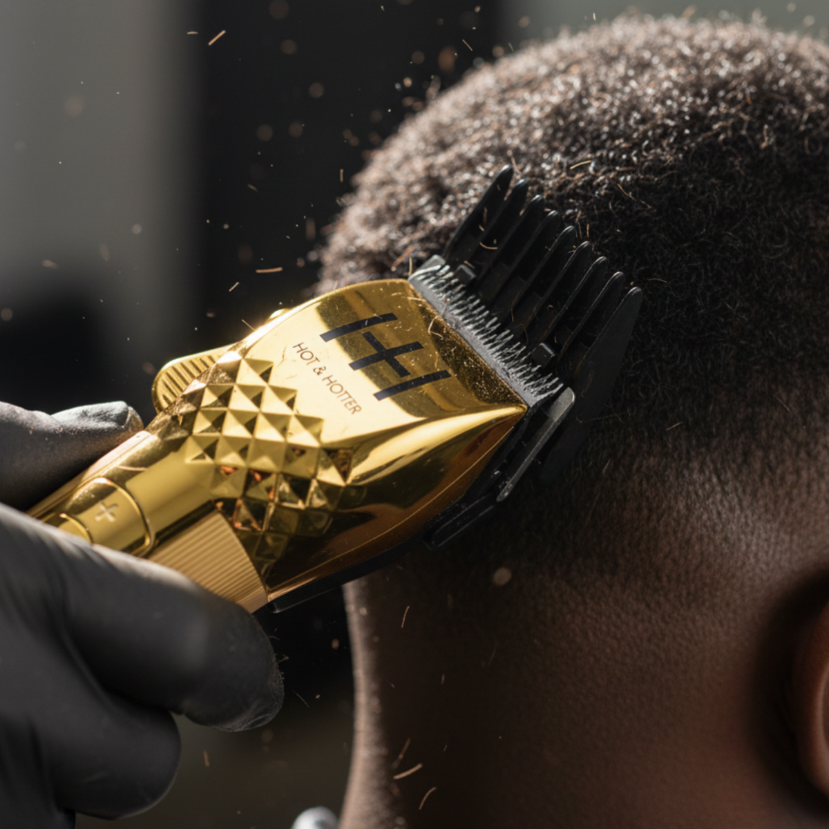 Hot & Hotter Lithium Cordless Clipper, Gold — clipper cutting hair close-up