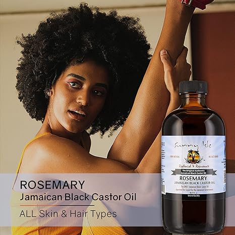 Rosemary Jamaican black castor oil bottle with rosemary label beside model