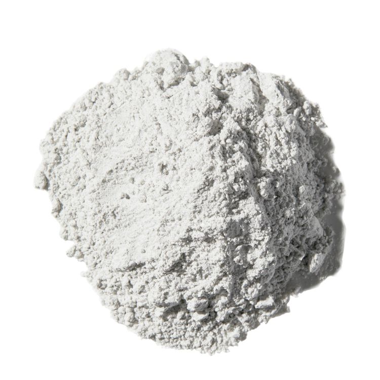 A pile of light gray colored shaving powder on a white background.
