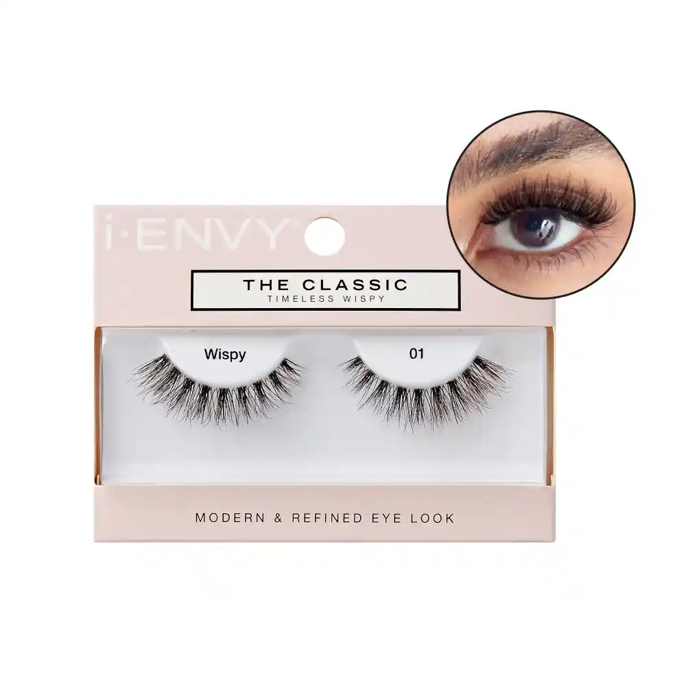 ITC01_main "A single false eyelash. The eyelash is curved and features multiple individual strands that vary in length, creating a voluminous and dramatic effect. The strands are densely packed near the base and gradually become sparser towards the tips. The overall appearance is designed to enhance the natural lashes by adding length and fullness. The false eyelash is black in color, giving it a bold and striking look."