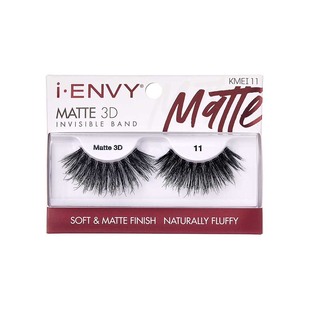 KMEI11_main "A single false eyelash. The eyelash is black and features a dense, voluminous arrangement of synthetic fibers designed to mimic natural eyelashes. The fibers are arranged in a slightly curved shape to fit along the natural lash line, with the ends tapering to a fine point. The base of the eyelash appears to be a thin, flexible strip that would be used to adhere the false eyelash to the eyelid."