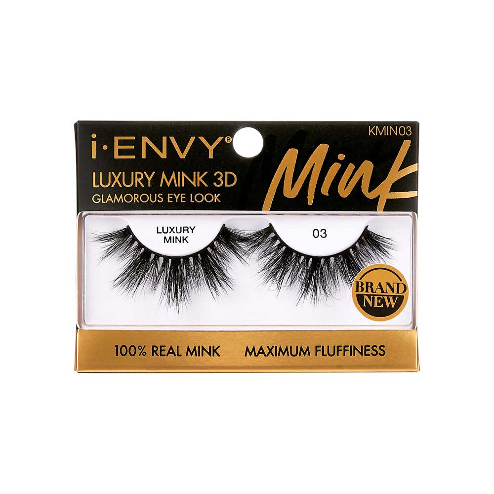 KMIN03_main "A single false eyelash. The eyelash is black and features a dramatic, voluminous design with long, wispy strands. The base of the eyelash is a thin, flexible strip that is used to attach the eyelash to the eyelid. The strands of the eyelash vary in length, creating a natural yet bold look."