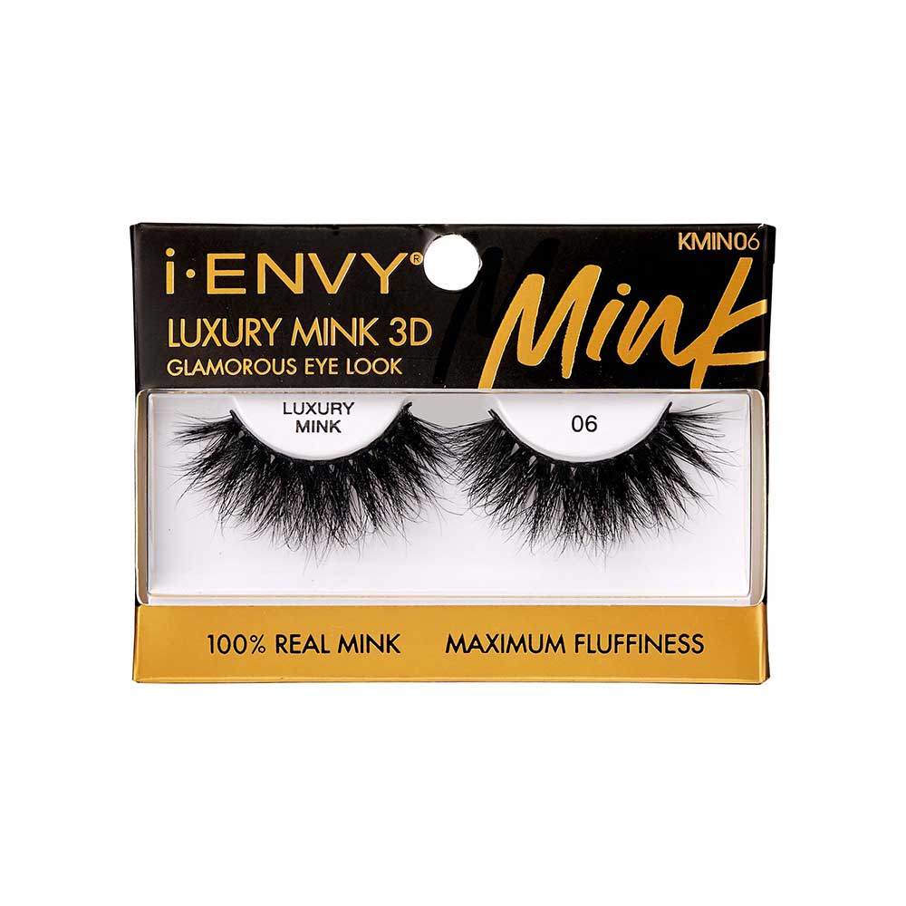 KMIN06_main "A single false eyelash. The eyelash is black and features a thick, voluminous design with long, wispy strands. The base of the eyelash strip is slightly curved to fit the natural contour of the eyelid. The individual lashes are densely packed, creating a dramatic and full appearance."