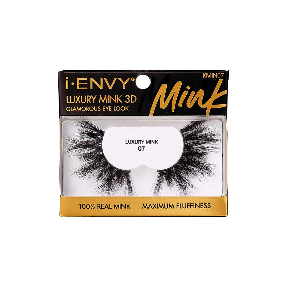 KMIN07_main "A single false eyelash. The eyelash is black and features a dramatic, voluminous design with long, wispy strands. The individual lashes are densely packed at the base and taper off into finer, more delicate tips, creating a full and fluttery appearance. The lash band appears to be flexible, allowing for easy application to the eyelid."