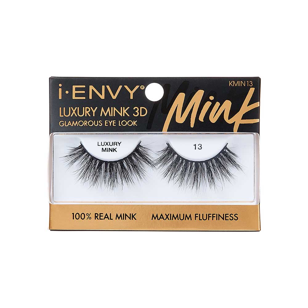 KMIN13_main "A single false eyelash. The eyelash is black and features a dramatic, voluminous design with long, wispy strands. The lashes are arranged in a slightly curved shape, mimicking the natural curve of the eye. The individual strands vary in length, creating a fluttery and full appearance. The base of the eyelash is a thin, flexible band designed to adhere to the eyelid."