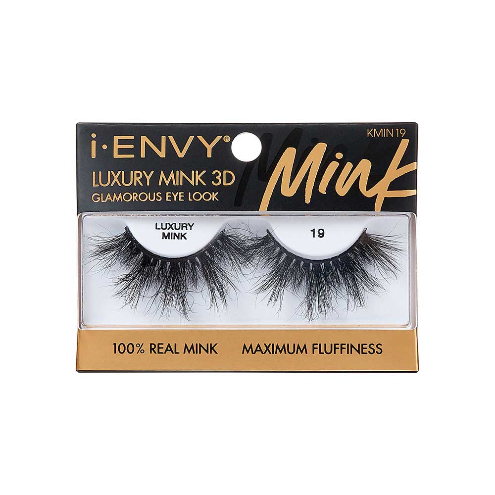 KMIN19_main "A single false eyelash. The eyelash is black and features a dramatic, voluminous design with long, wispy strands. The base of the eyelash is curved to fit the natural shape of the eyelid, and the individual lashes vary in length, creating a fluttery and full appearance."