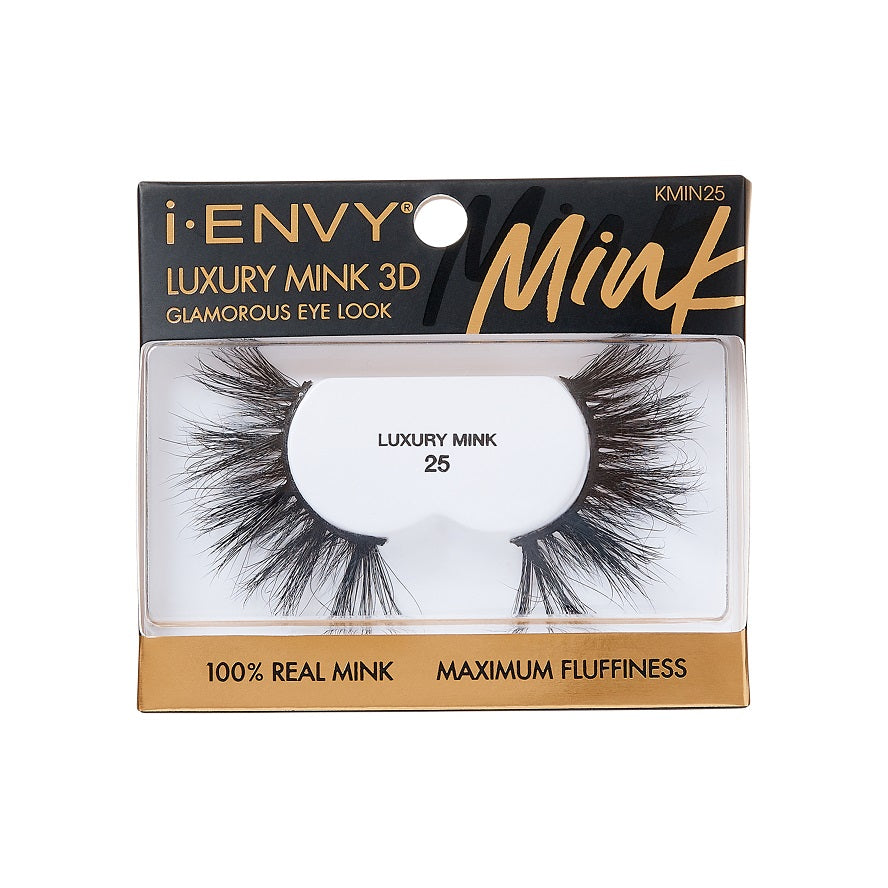 KMIN25_main "A single false eyelash. The eyelash is black and features a dramatic, voluminous design with long, wispy strands. The base of the eyelash is curved to fit the natural shape of the eyelid, and the individual strands vary in length, creating a fluttery and full appearance. The overall look is bold and glamorous, suitable for enhancing the eyes for special occasions or dramatic makeup looks."