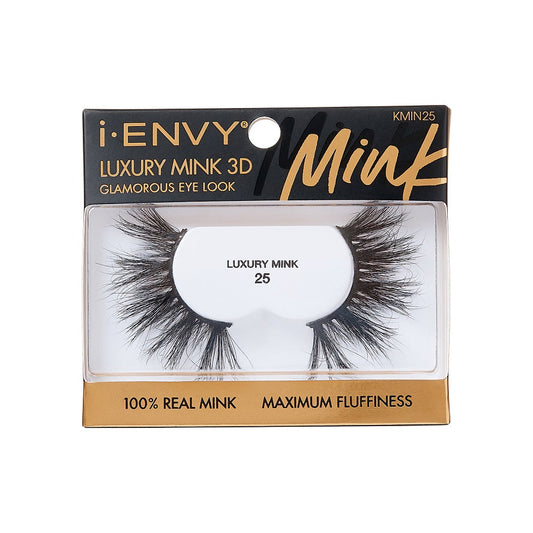 KMIN25_main "A single false eyelash. The eyelash is black and features a dramatic, voluminous design with long, wispy strands. The base of the eyelash is curved to fit the natural shape of the eyelid, and the individual strands vary in length, creating a fluttery and full appearance. The overall look is bold and glamorous, suitable for enhancing the eyes for special occasions or dramatic makeup looks."