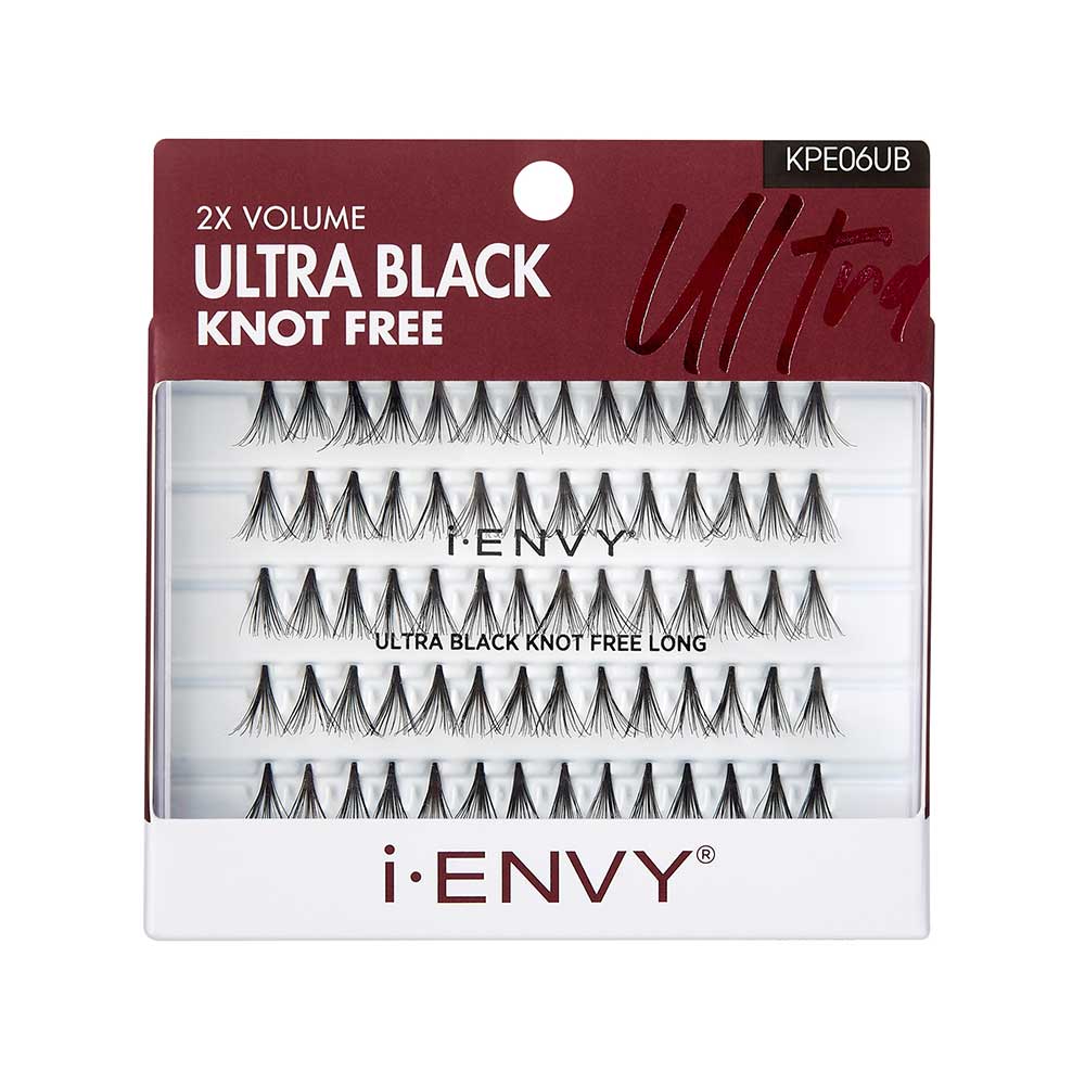 KPE06UB_main "A package of i-ENVY brand false eyelashes. The packaging is predominantly white with a maroon and black design. The top of the package reads "2X VOLUME ULTRA BLACK KNOT FREE" in bold white and black text on a maroon background. The product code "KPE06UB" is displayed in the top right corner. The middle section of the package has a clear window through which multiple rows of individual false eyelashes can be seen."