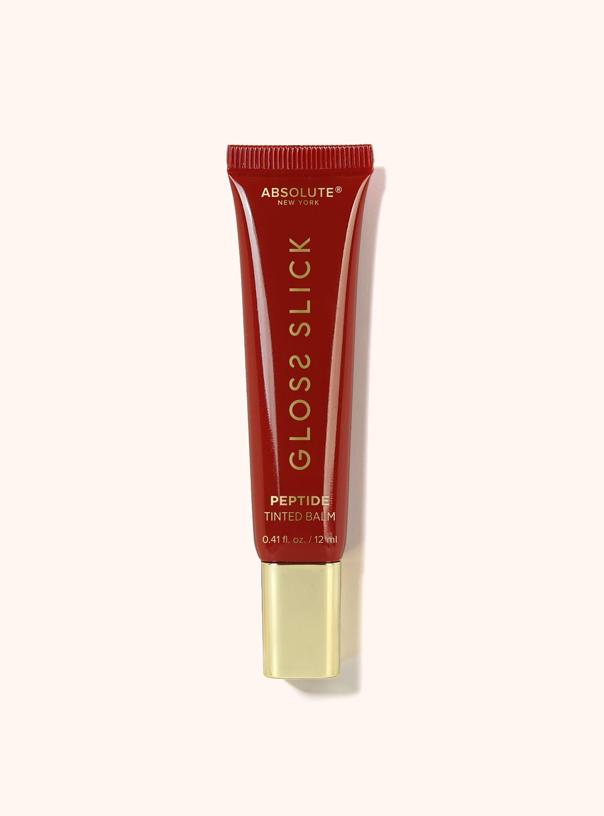 Absolute New York Gloss Slick Peptide Tinted Balm – Strawberry Crush red tube