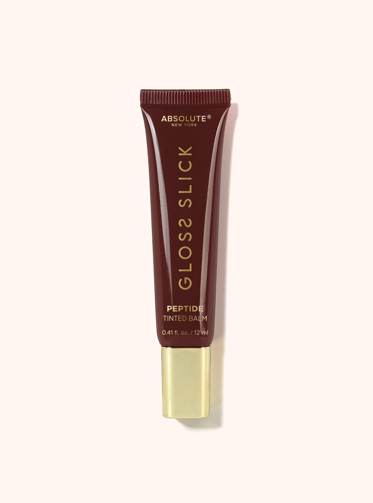 Absolute New York Gloss Slick Peptide Tinted Balm – Macadamia Roast deep brown tube