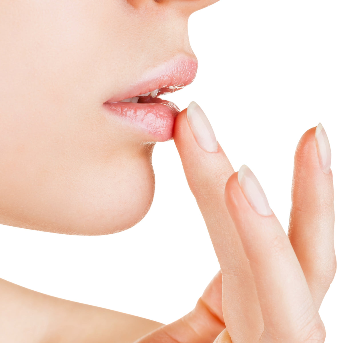 Fingertip applying lip balm to lips