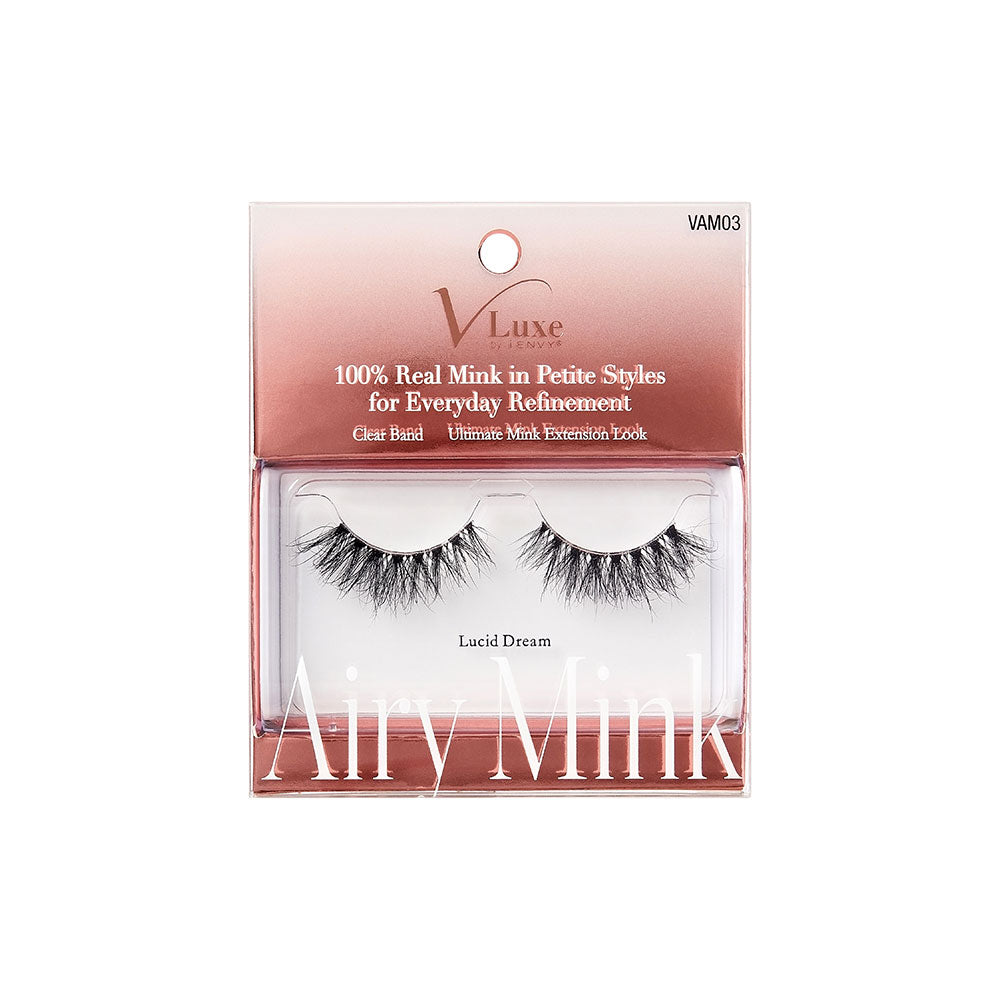 VAM03_main "A single false eyelash. The eyelash is curved and features long, wispy, and voluminous black fibers. The fibers are arranged in a way that mimics natural eyelashes, with varying lengths to create a fuller and more dramatic look. The base of the eyelash is thicker and appears to be designed for easy application to the eyelid. The overall appearance is elegant and suitable for enhancing the eyes for makeup purposes."