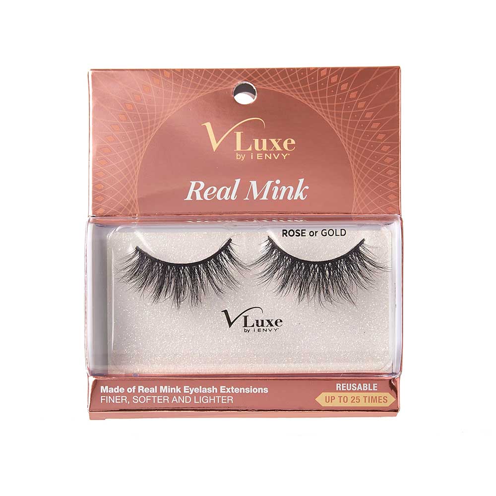 VLEC01_main "A single false eyelash. The eyelash is black and has a thick, voluminous appearance with numerous fine, wispy strands. The base of the eyelash is curved to fit the natural shape of the eyelid. The strands vary in length, creating a natural, fluttery look. The overall design suggests it is intended to enhance the fullness and length of the wearer's natural eyelashes."