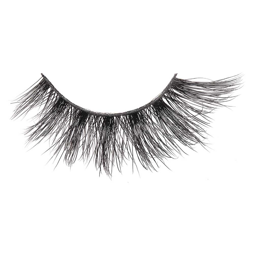 VLEC03_extra_003 "A package of false eyelashes. The packaging is transparent, allowing the eyelashes to be clearly visible. The eyelashes are thick and voluminous, with a slightly curled design. The brand name "V Luxe by i-Envy" is printed on the packaging, along with the style name "Velvet Rose." The background inside the packaging has a subtle, glittery texture."