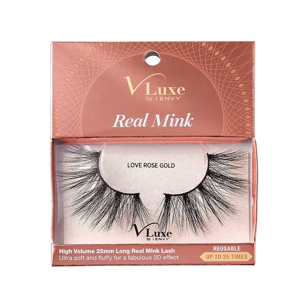 VLEC06_main "A single false eyelash. The eyelash is black and has a dense, voluminous appearance with multiple layers of fine, synthetic fibers. The fibers are arranged in a slightly curved shape, mimicking the natural curve of an eyelid. The base of the eyelash is thicker and tapers off towards the tips, giving it a natural look. The overall design suggests it is intended to enhance the fullness and length of natural eyelashes when applied."