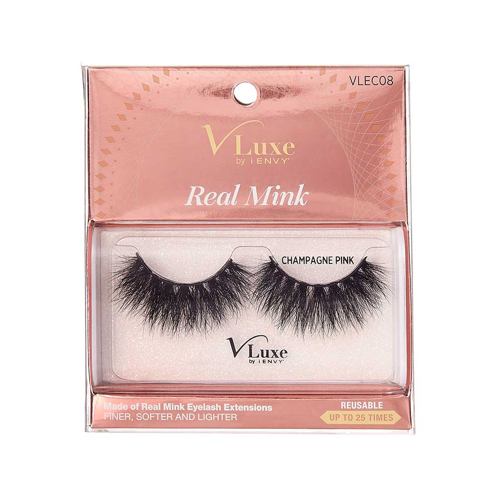VLEC08_main "A single false eyelash. The eyelash is black and features a dense, voluminous design with varying lengths of individual lashes, creating a dramatic and full appearance. The base of the eyelash is a thin, flexible strip that is used to attach the eyelash to the eyelid. The lashes are arranged in a slightly curved shape to fit the natural contour of the eye."