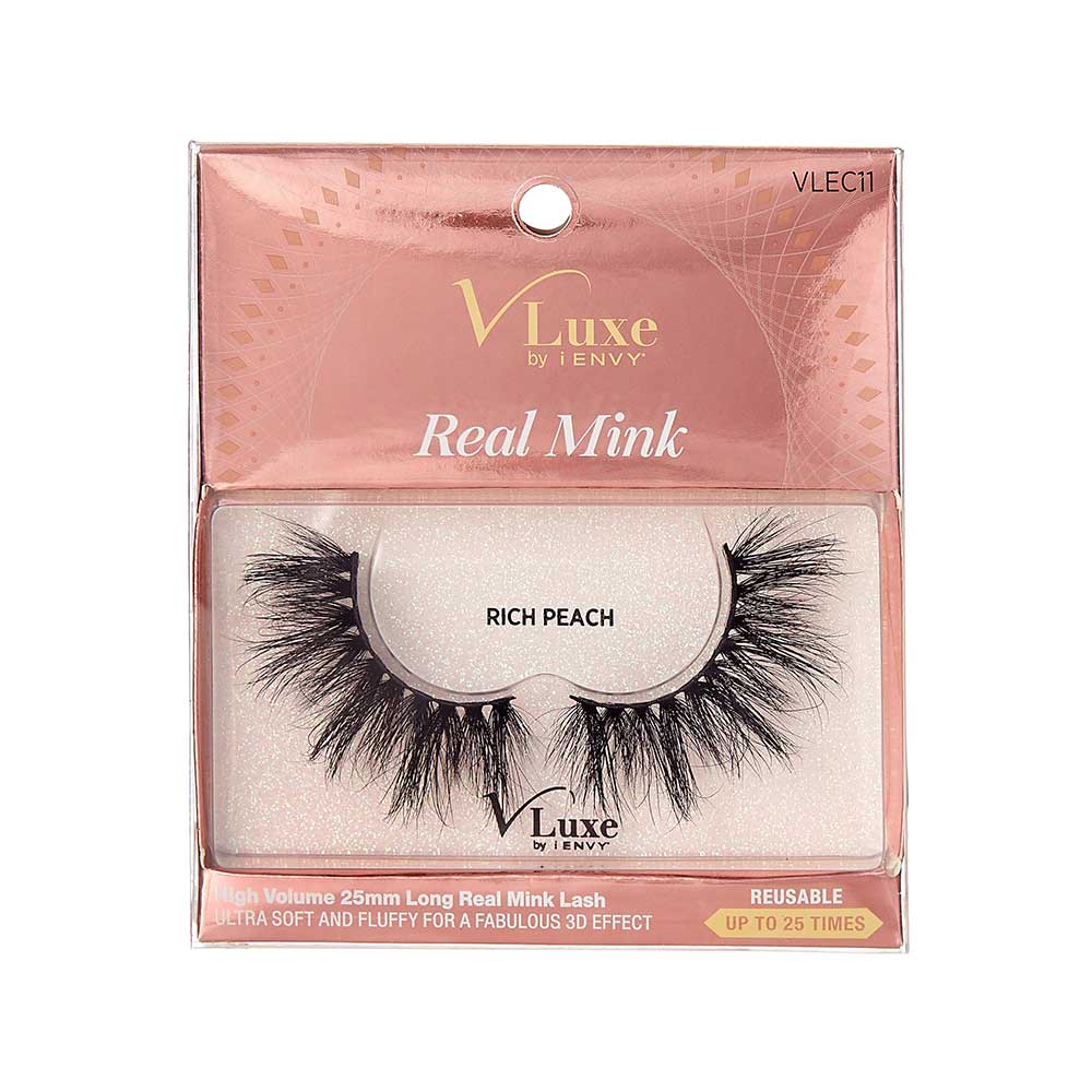 VLEC11_main "A single false eyelash. The eyelash is black and features a thick, voluminous design with multiple layers of fine, wispy strands. The base of the eyelash is a dark band that appears to be flexible, allowing it to conform to the natural lash line when applied. The strands of the eyelash are longer towards the outer edge, creating a dramatic, fluttery effect."