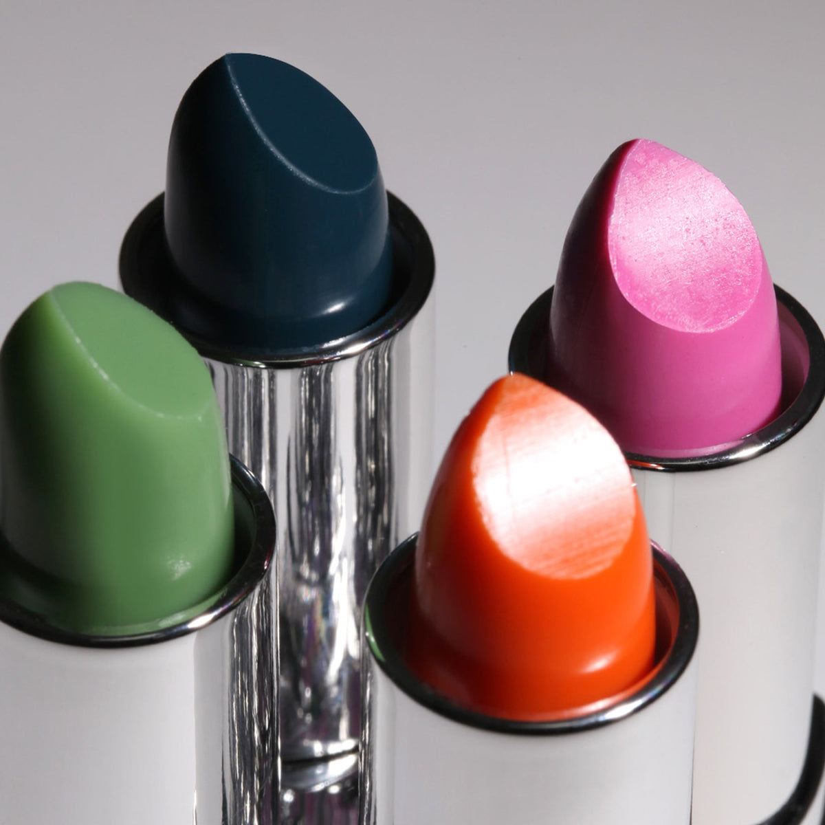 Nicka K Mood Lipstick, four open lipstick bullets
