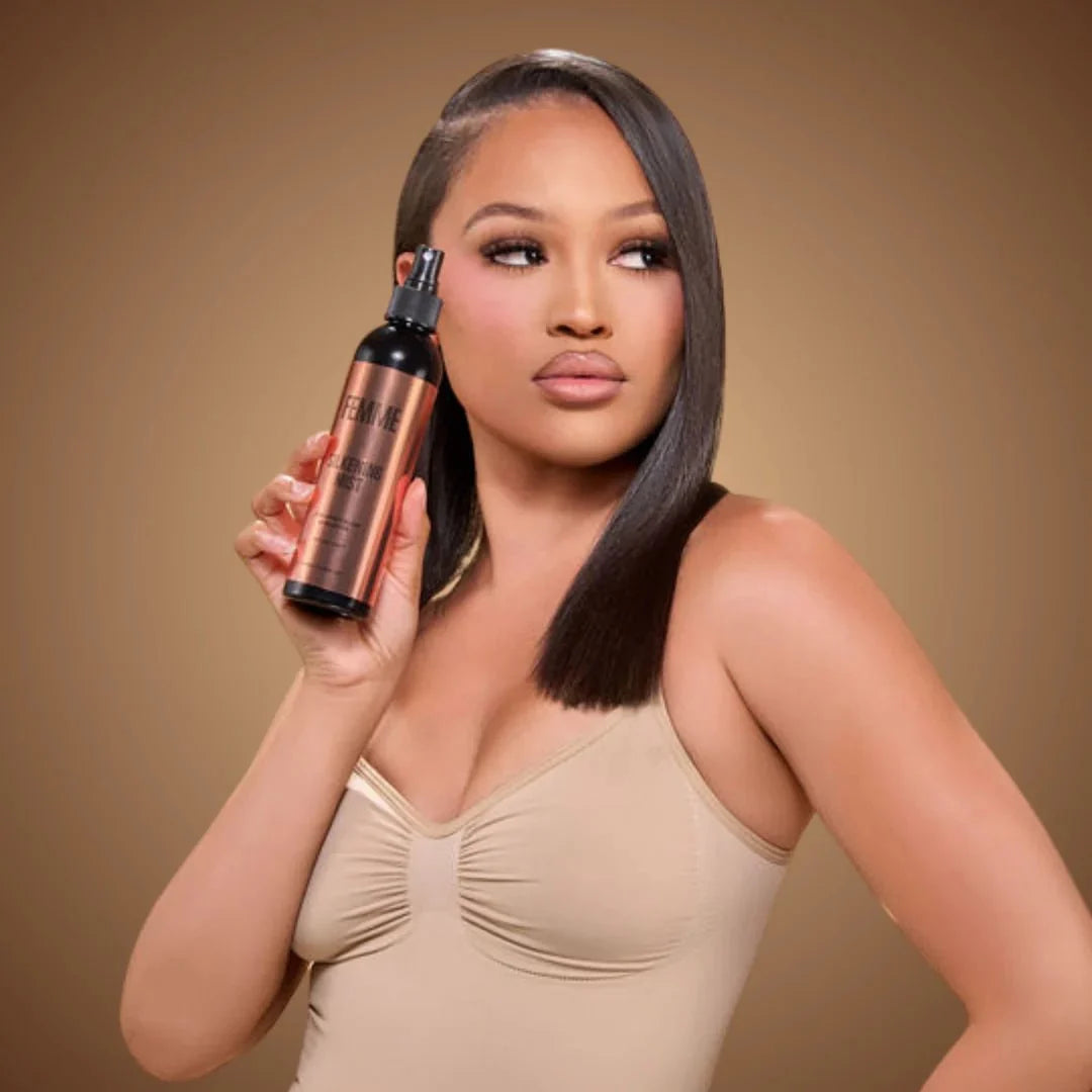 Model with straight dark bob holding Femme Silkening Mist