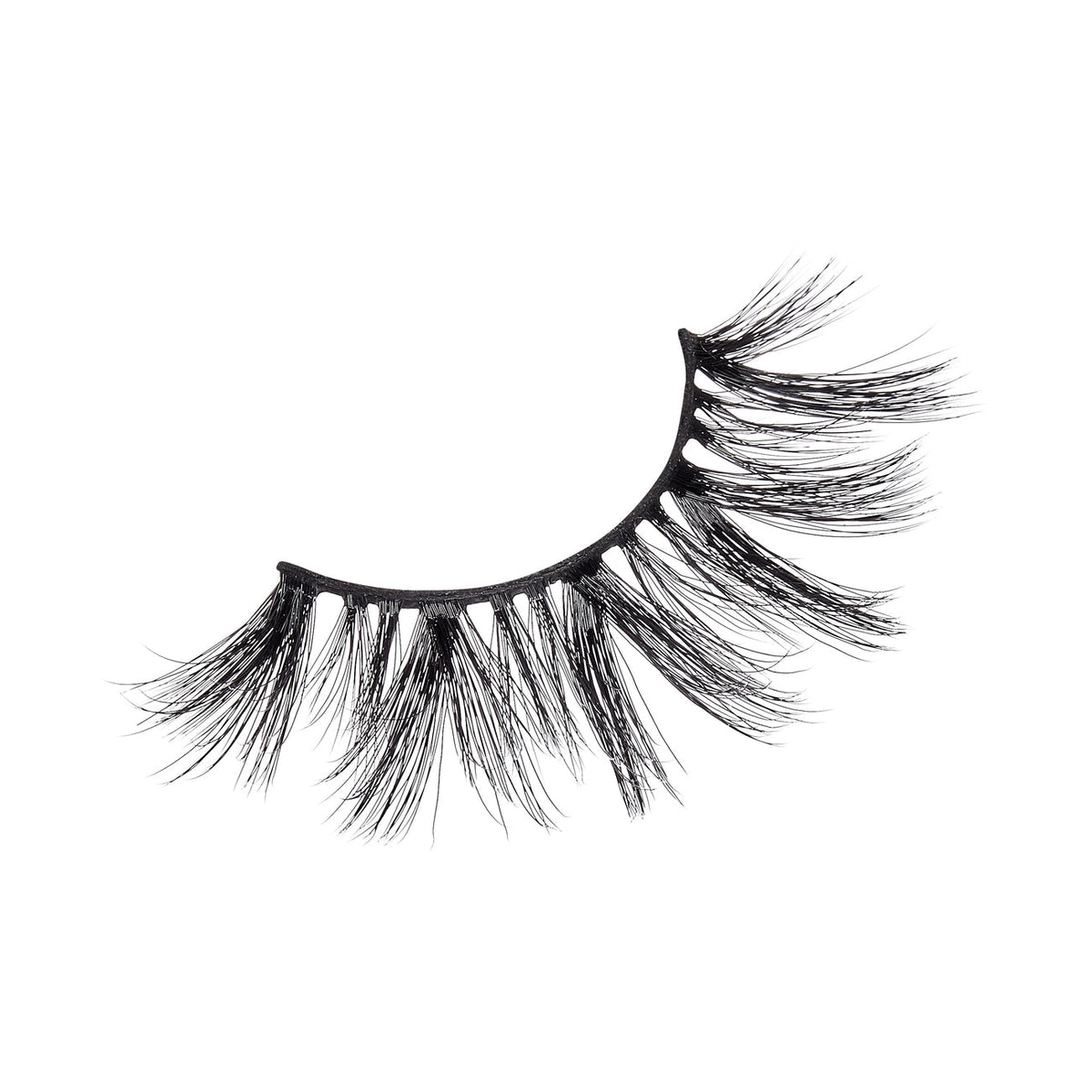 A single false eyelash. The eyelash is black and features a dramatic, voluminous design with long, thick, and wispy strands. The lashes are arranged in a slightly curved shape, mimicking the natural curve of the eye. The base of the eyelash is a thin, flexible band that holds the individual lash fibers together.