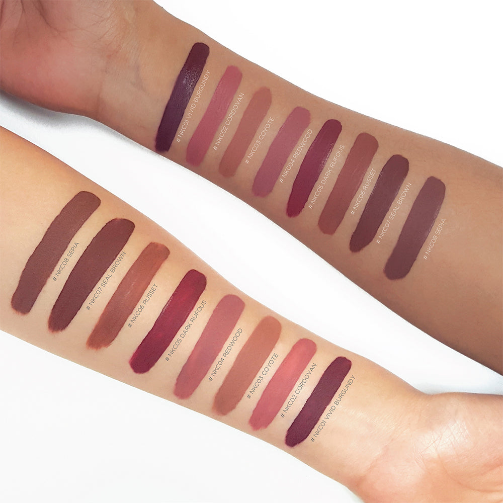 Nicka K Whipped Lipgloss color swatches on two arms