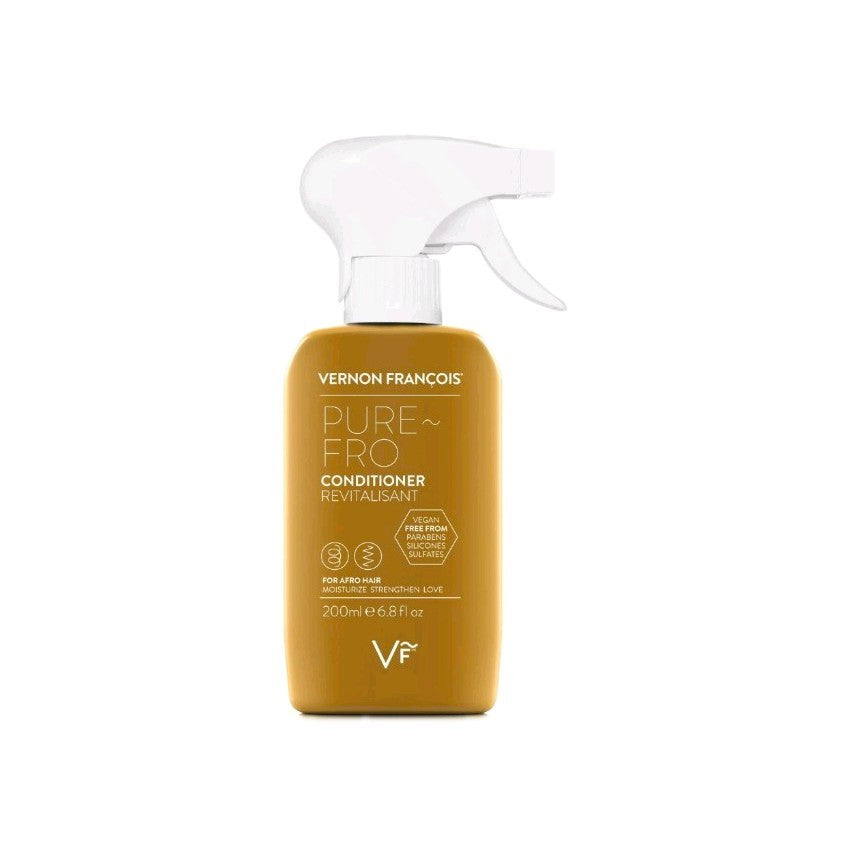 Vernon François PURE~FRO conditioner bottle with white label, gold cap, and white spray trigger on wooden surface.